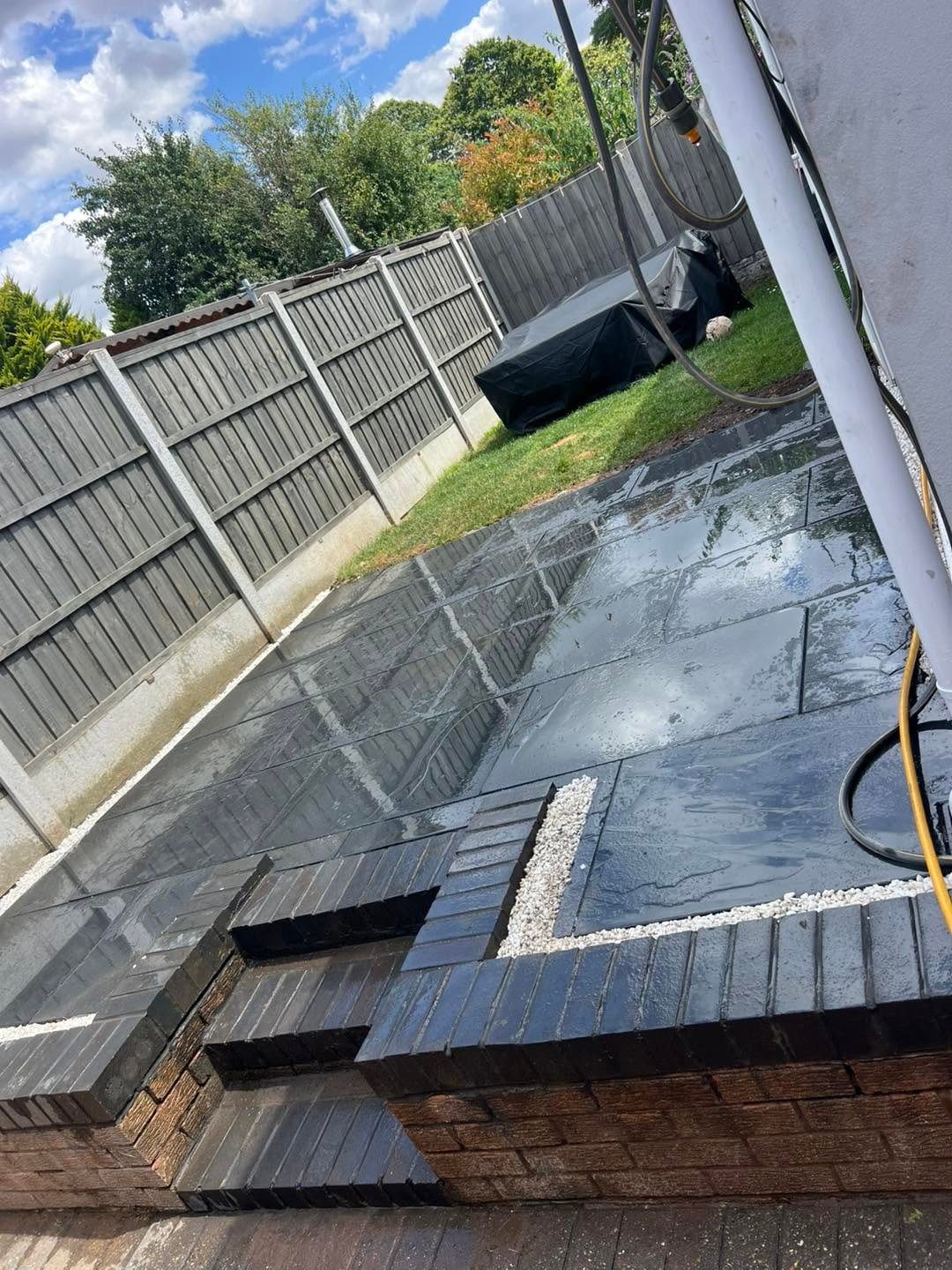 Custom Stone Patio with Decorative Inlay